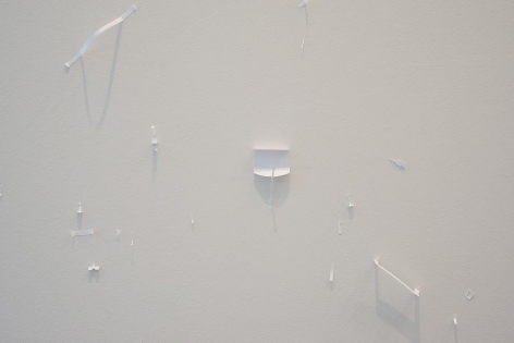 Marco Maggi, White Specific, 2013. White stickers on corridor wall, Dimensions variable.