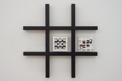 Marco Maggi, HO2 (Helio Oiticica Wall Unit), 2013. Two Metaesquema Turner boxes with cuts and folds on 500 pages each, 9 in. x 9 in. x 3 in.